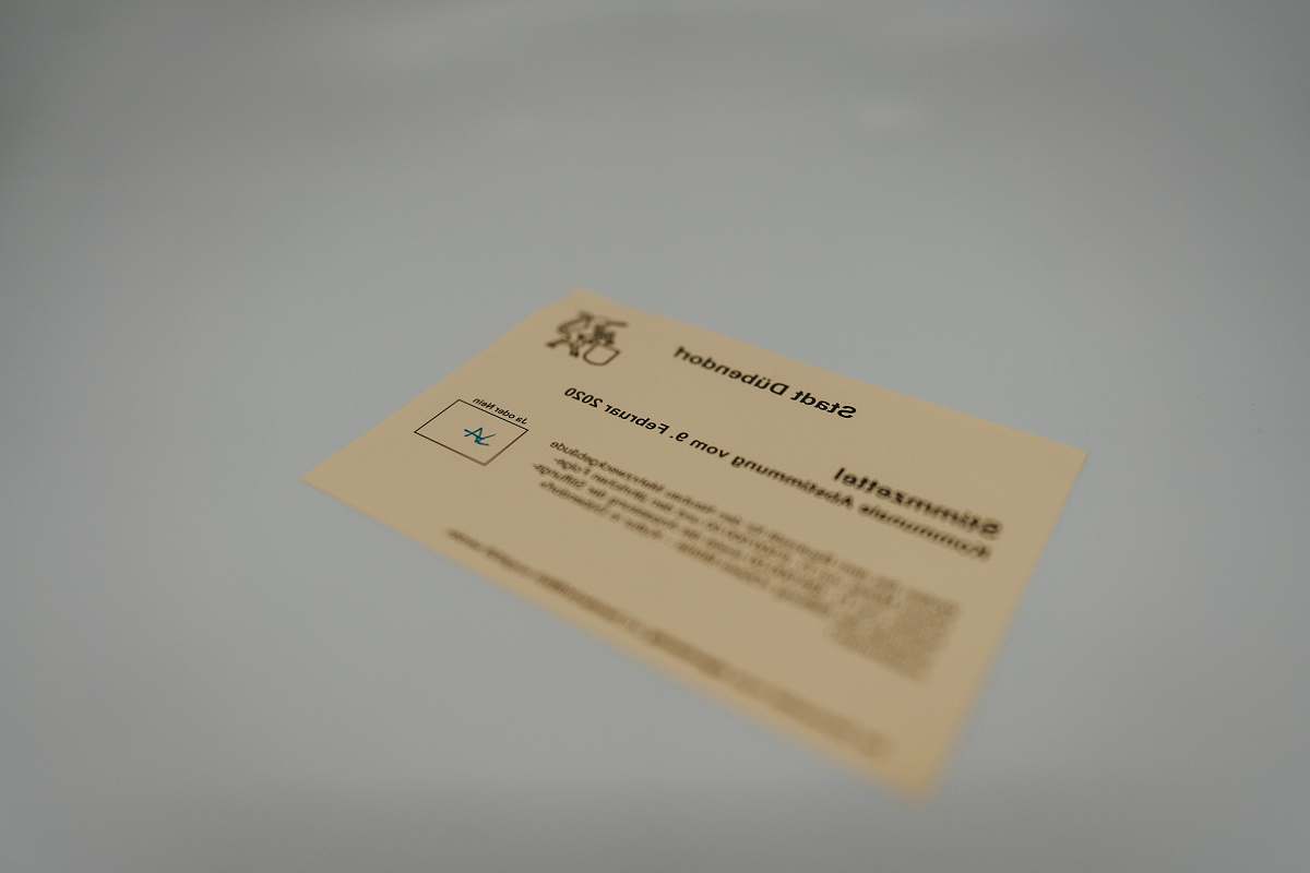 business card brown card on white table paper